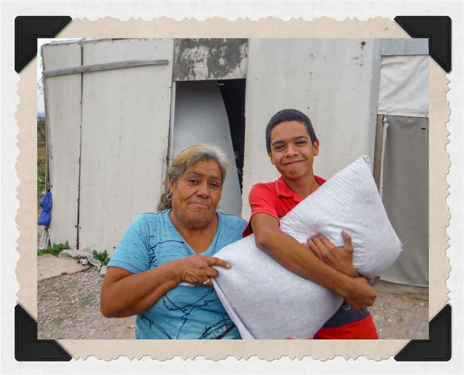 boy and grandmom with beans
